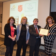 DSC_030320171115105030 Representatives of Waltham food pantries present an appreciation award to GWArc in recognition of the Rotary-GWArc Food Pantry Project. Left to right: Maureen Bagge Fowler, Diaper Depot; Carolyn Montalto, Executive Director, Community Day Center of Waltham; Dick Lyons, Bristol Lodge Food Pantry; and Roz Rubin, GWArc CEO. Rotary Club of Waltham members donate funds at their weekly meetings and
GWArc participants shop and deliver food and supplies to local pantries.